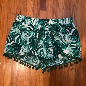 Green palm tree print Pom Pom shorts